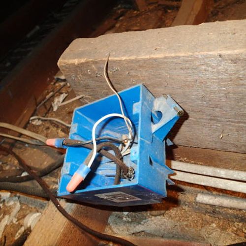 open junction box in the attic