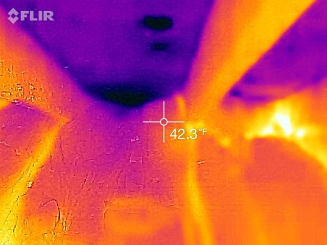 The dark spot at the lower portion indicates water