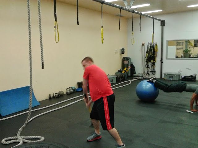 Mike doing sledgehammer swings