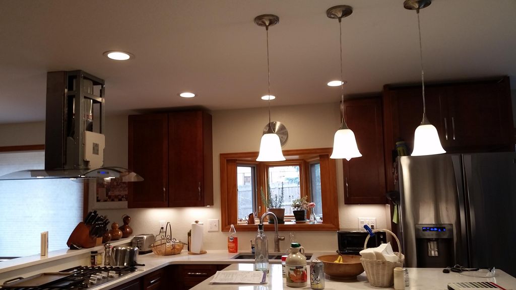 New kitchen lighting. Added recessed cans and thre