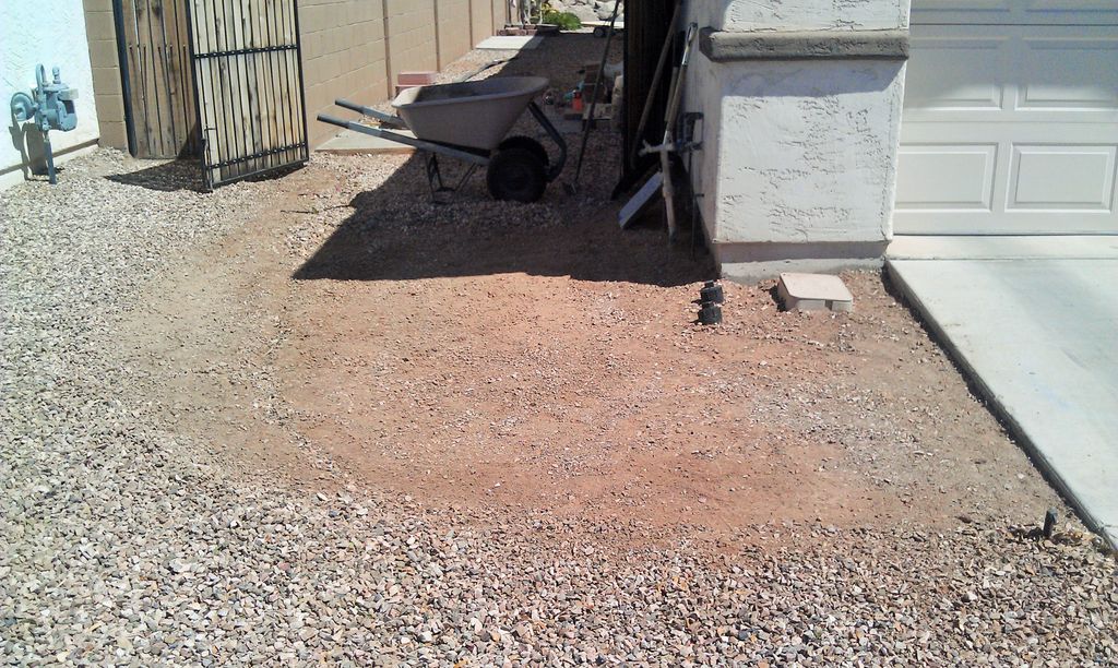 Preparing to lay down crushed granite