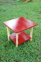 rustic end table with shelf 7 inches from bottom.