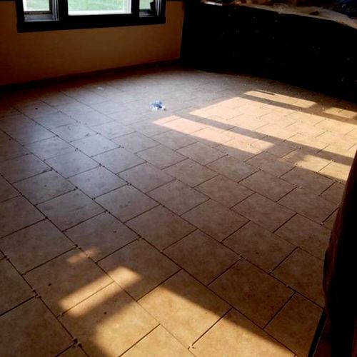 tile laid after cutting concrete and replacing dra