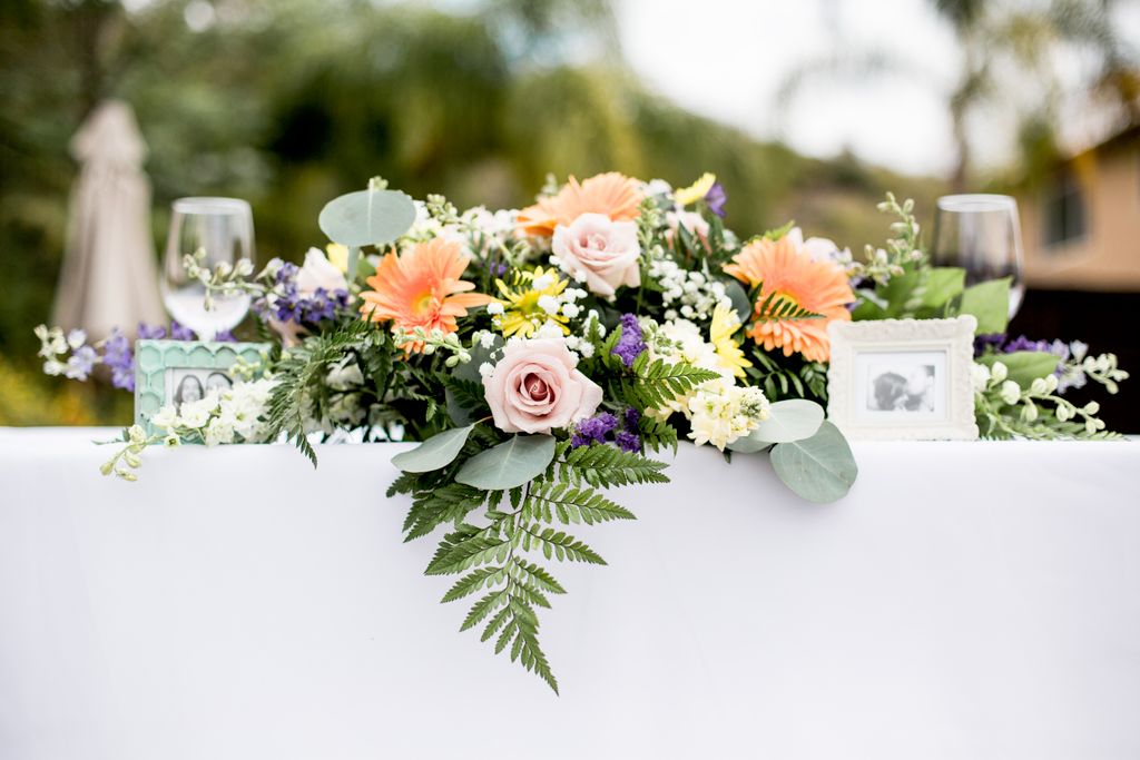 Head table is raised slightly above the guests, pe