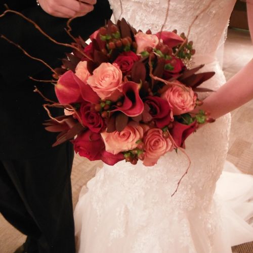 Brides fal bouquet with branches, berries, roses a