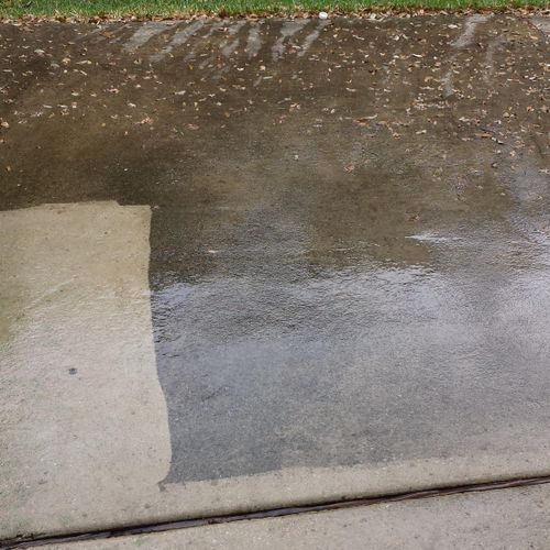 Power washing cement drives and walkways