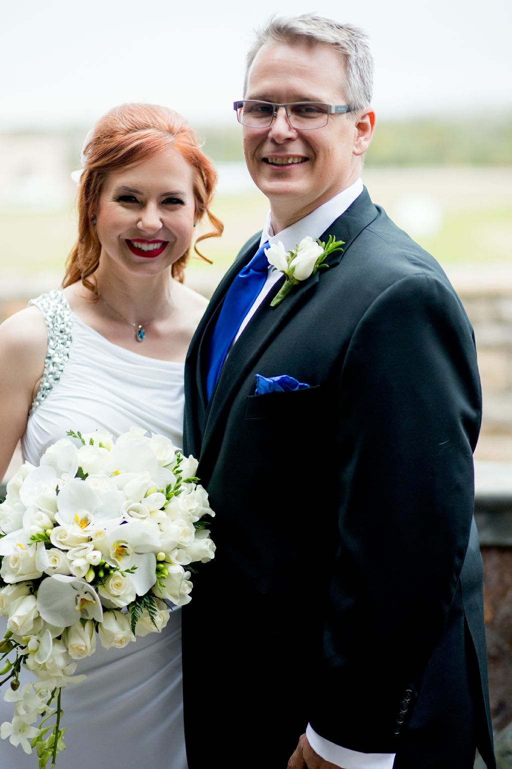 The bride and groom share a candid moment before t