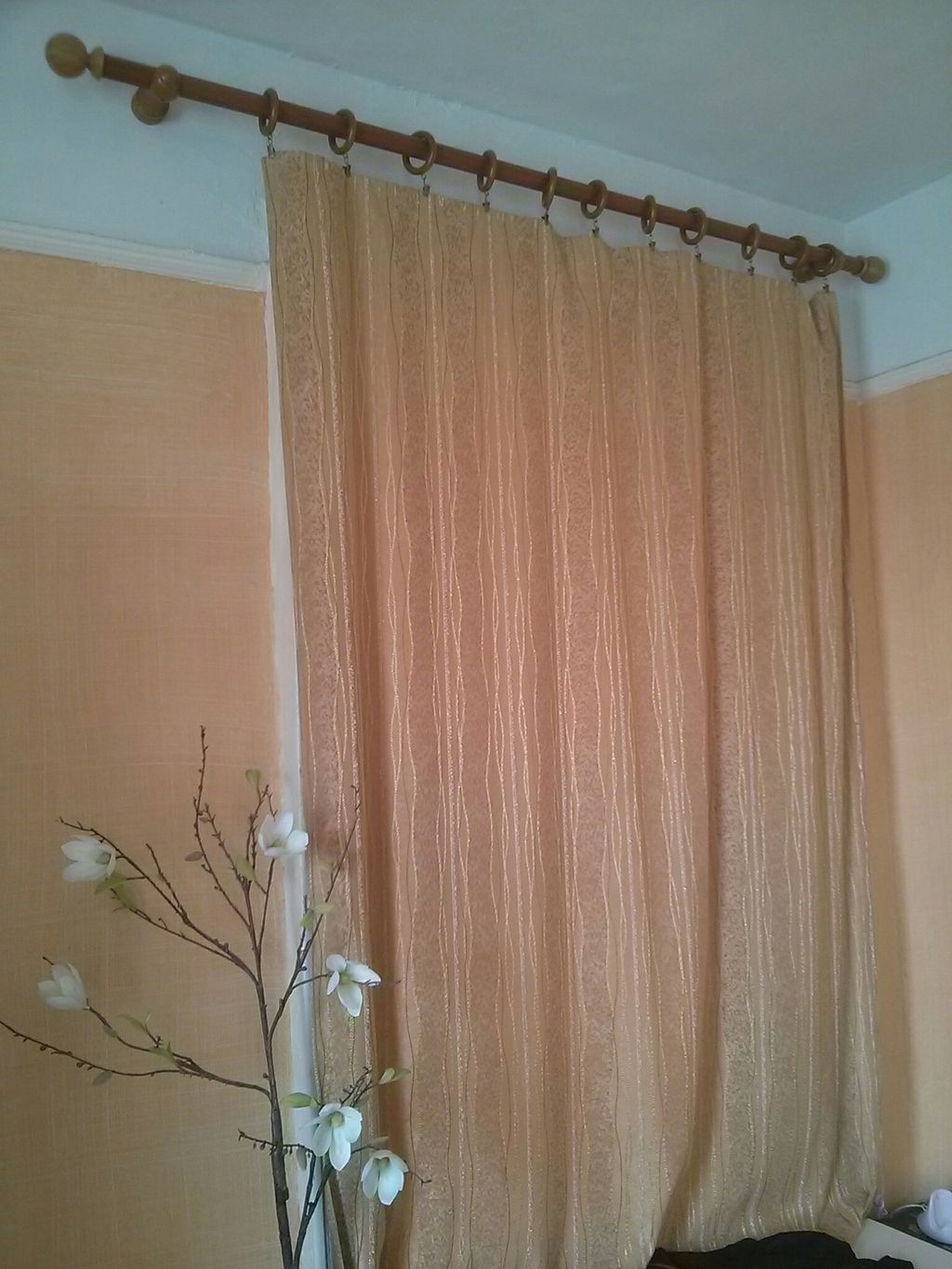Curtain  rod installed  and  curtains hung.