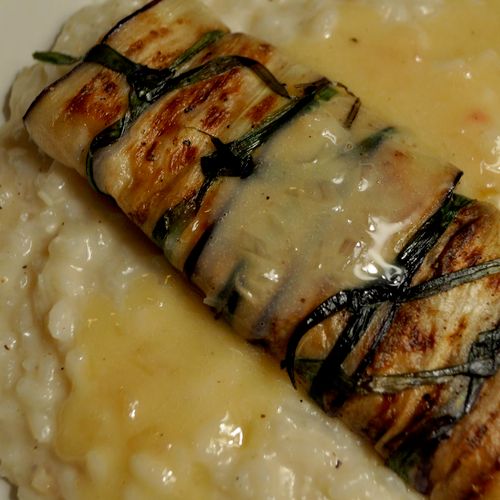 Egglant wrapped Snapper over Parmesean Risotto wit