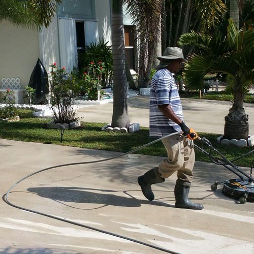55 Driveways pressure washed and bleached. Jupiter