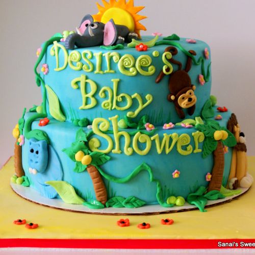 Two dimensional baby shower cake with elephant cak