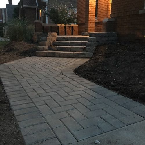 Paver sidewalk and new front porch and steps