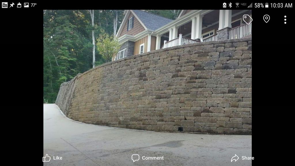 Residential retaining wall.  180' long;  tallest p