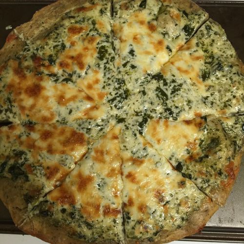 Spinach Alfredo Pizza on an herb crust 