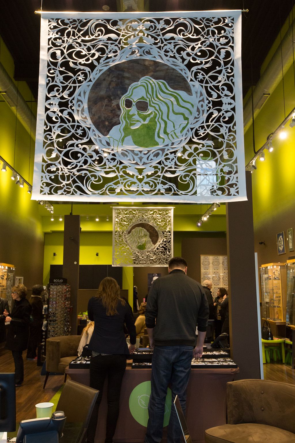 Large paper cut banners with paint. For Spex Eyegl
