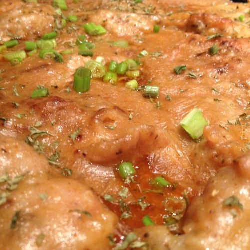 smothers turkey steaks in a creole roux
