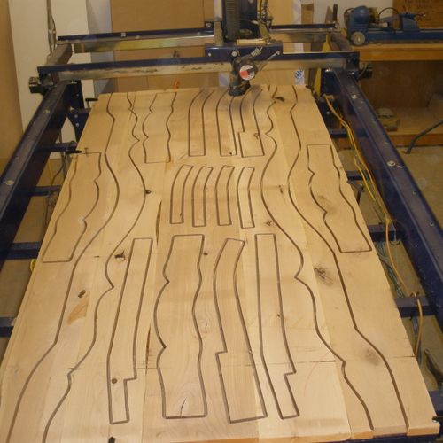 CNC machine with parts being cut.