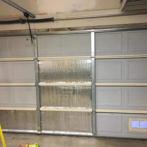 Insulate a garage door