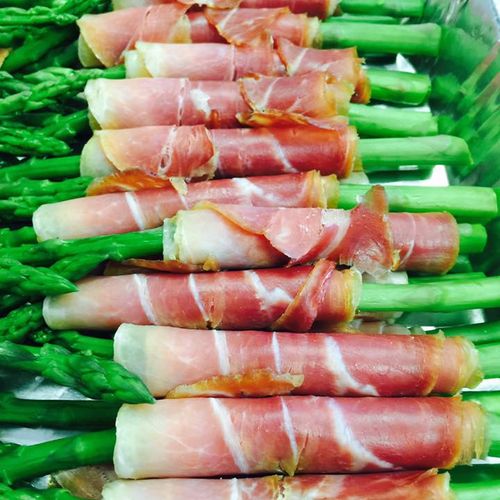 Prosciutto wrapped asparagus with a roasted red pe