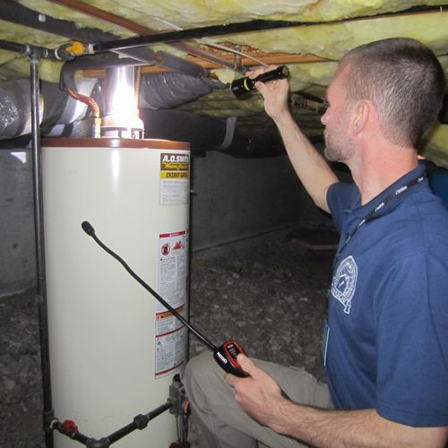 Checking the water heater for combustable gas leak