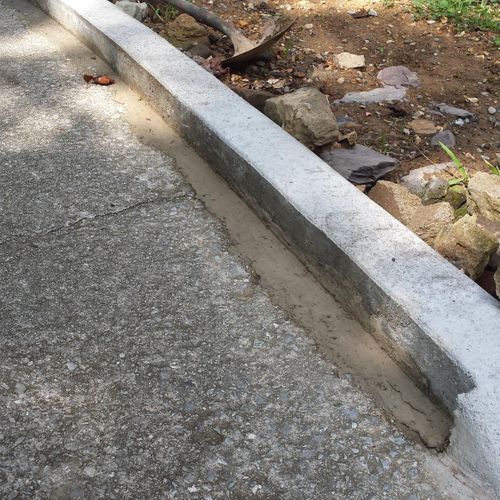 (ADD ON)formed & poured concrete curb along asphal