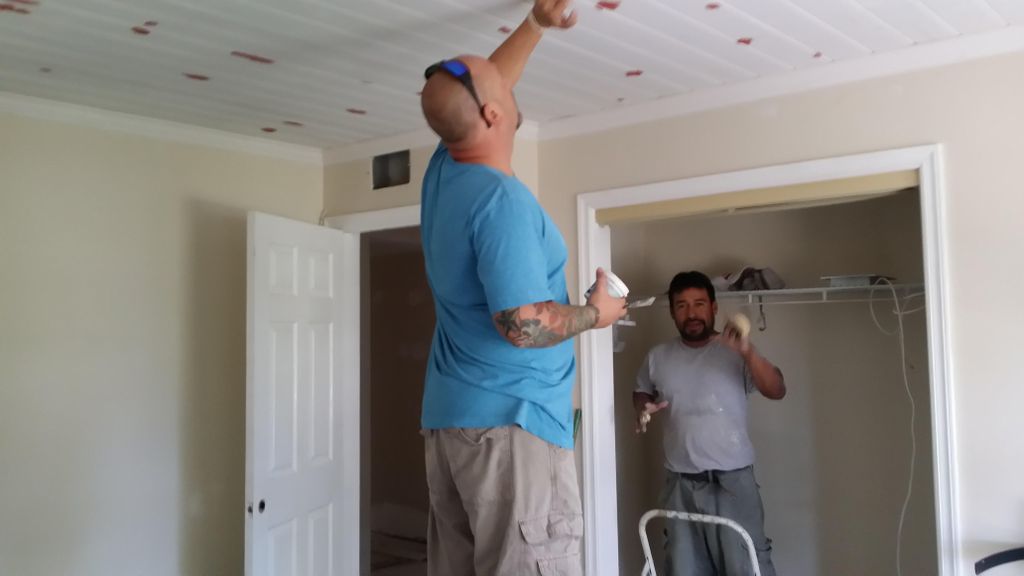 1x6 T&G paneling with crown molding to cover old "