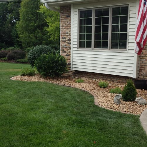 Adding new edging, plants and fresh rock