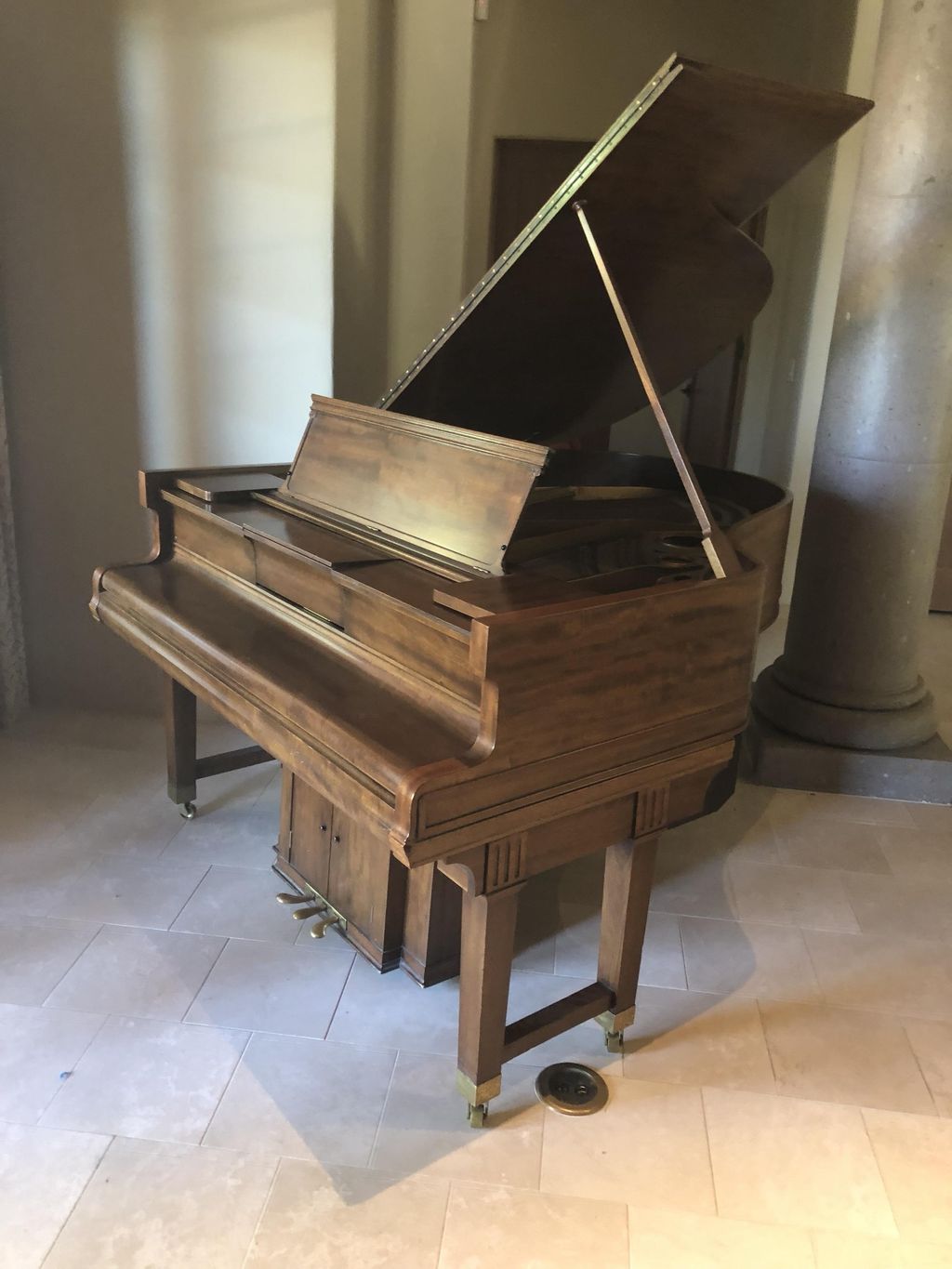 This was a baby grand piano we moved it to its new