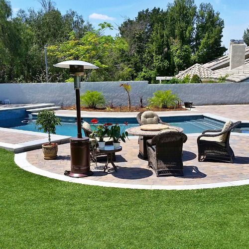 Interlocking Paver Pool Deck with Artificial Turf.