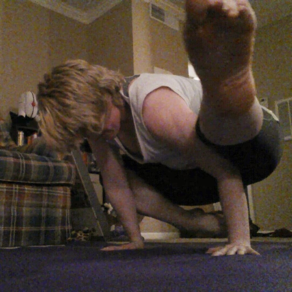 Half bakasana, half titibasana