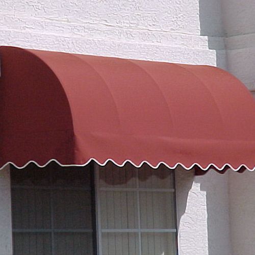 convex awning with scalloped valance