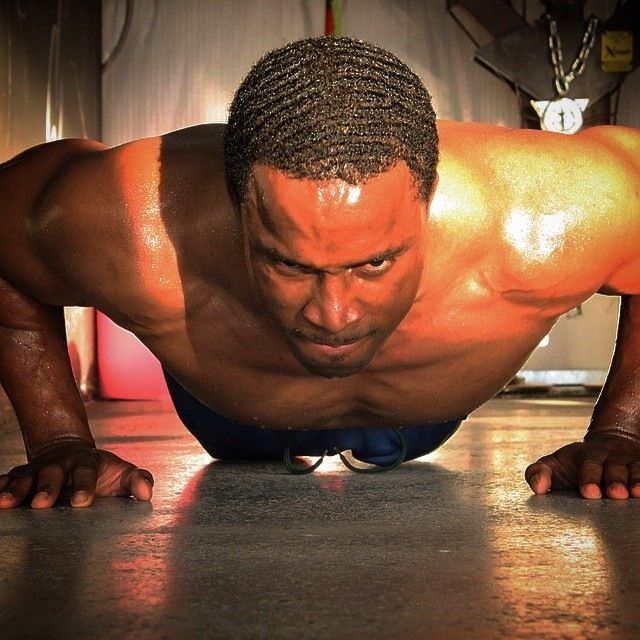 Demonstrating proper push-up techique