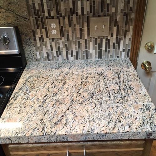 New granite tile countertop, new tile backsplash, 