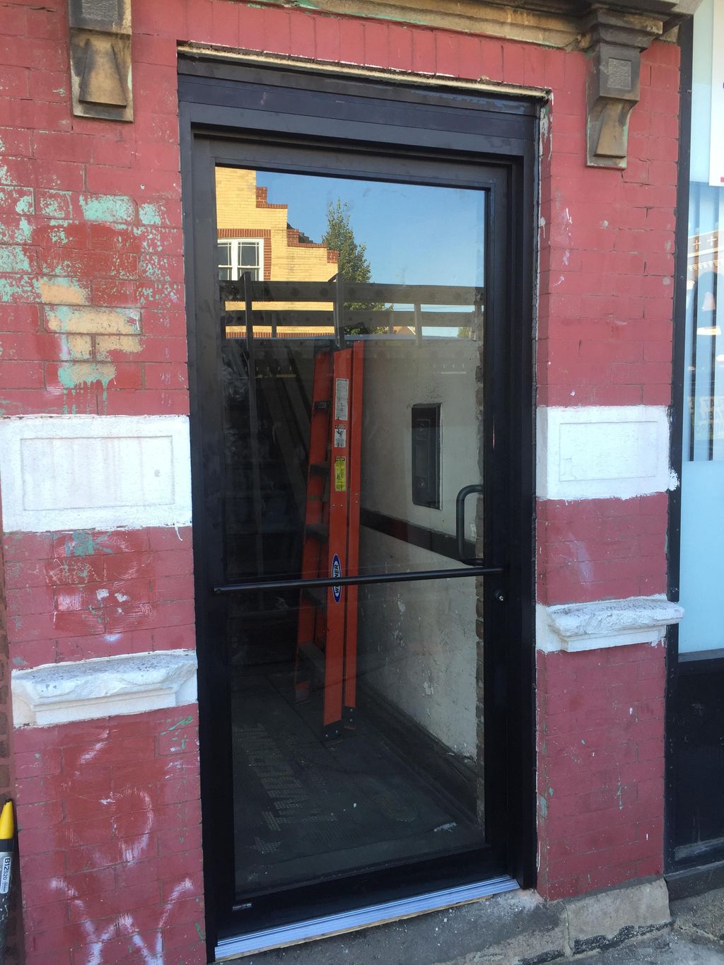 commercial standard dark bronze door