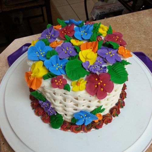 Basket weave cake with royal icing flowers