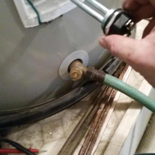 Water heater rebuild,replace thermostat and elemen