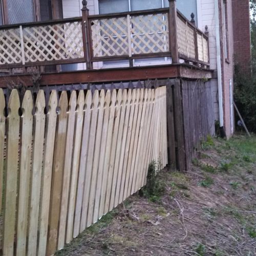 Fence and lattice on deck, after repairing missing
