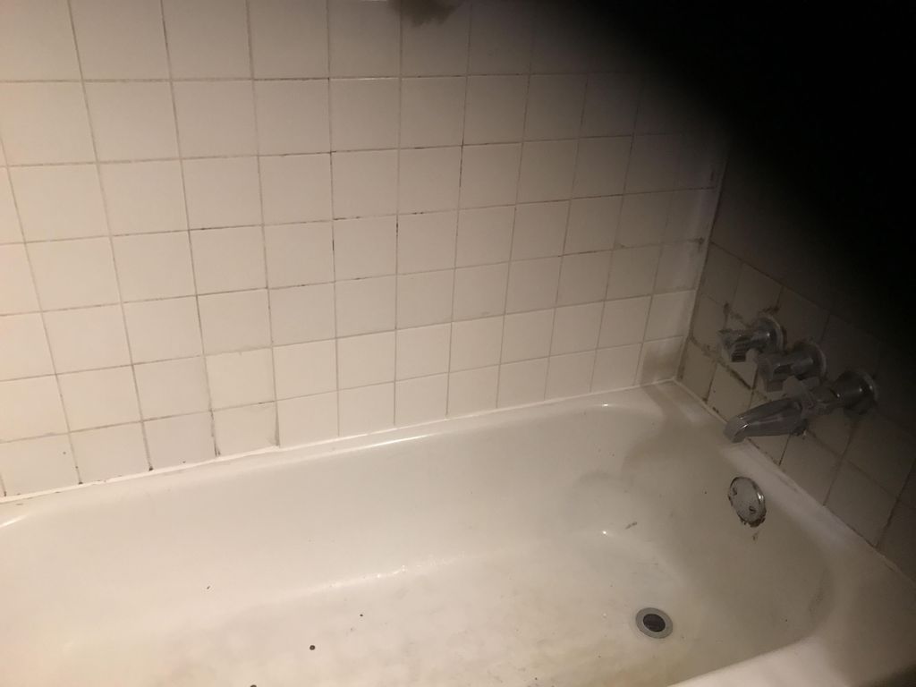 Maintenance repair work order water damage/tile da