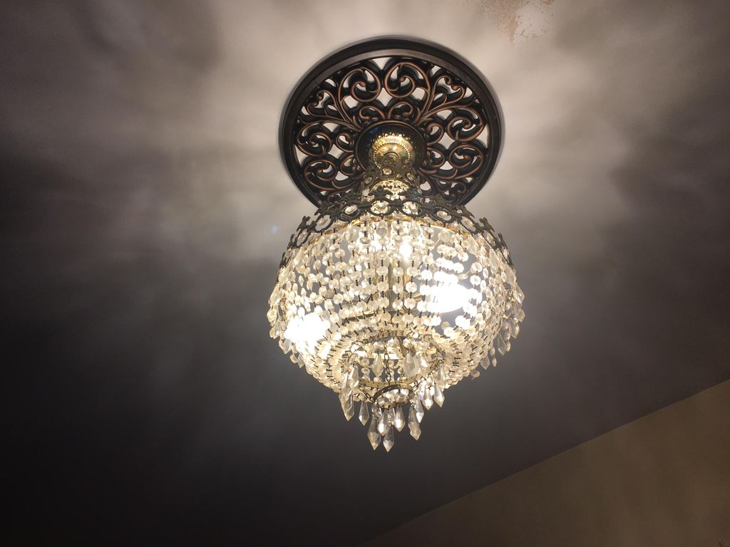 Chandelier Installation and Medallion.