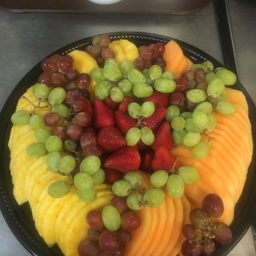Large fruit tray: pineapple, green and purple grap