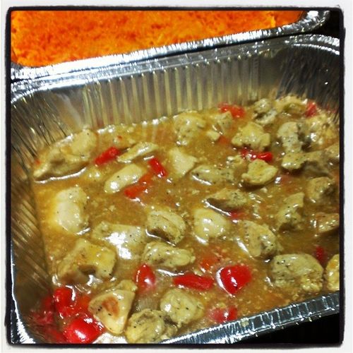 Stewed chicken breast with gravy, red peppers and 