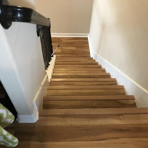 Wood floors in stairwell. 
