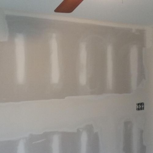 Repair a whole wall with new drywall, tape and mud