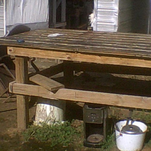 This sturdy work table was built with salvaged mat