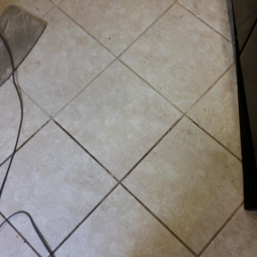 Example of a grout cleaning difference!  Top half 