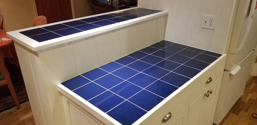 Re-grouted cracked and failed grout joints. We use