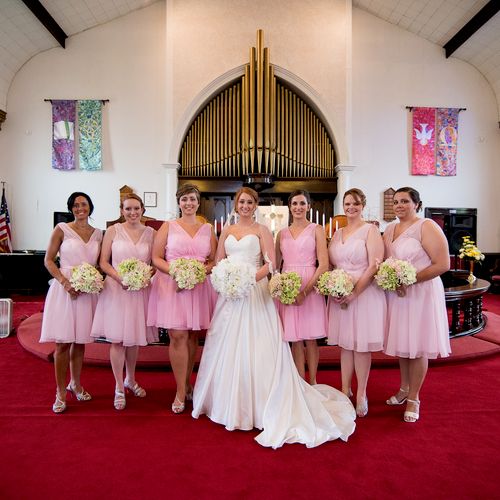 Bride, bridesmaids in church