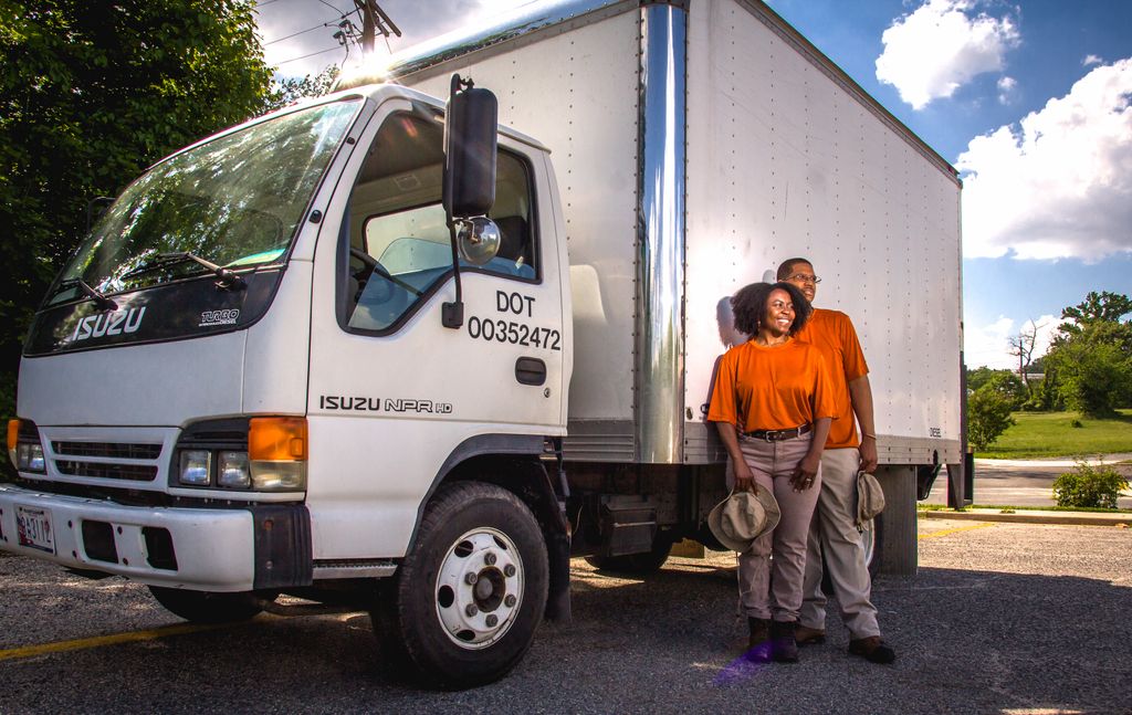 The owners, with our truck