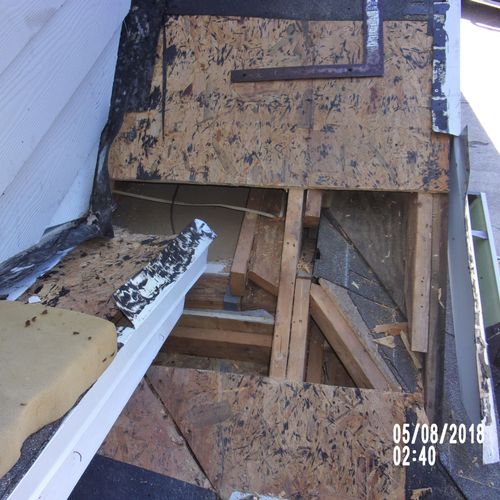 ROOF LEAKING DAMAGED SHEATHING REMOVED DURING
