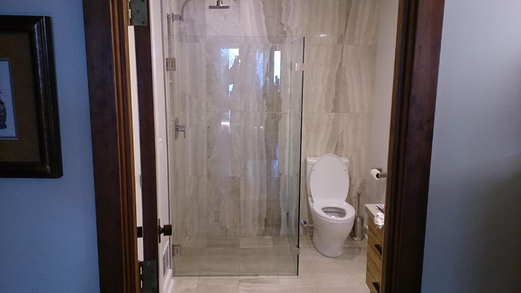 Handicap-accessible custom tile shower.